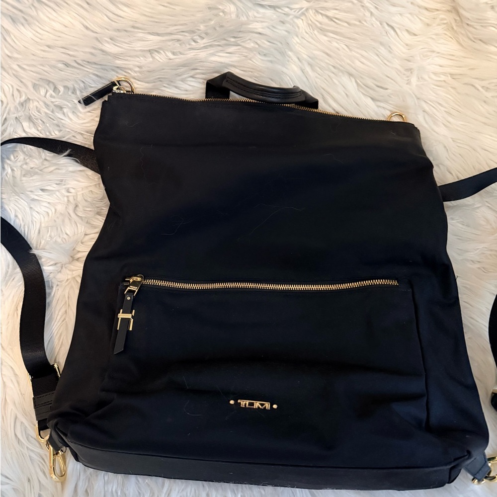 Tumi Black Backpack/Messenger Bag with Gold Accents